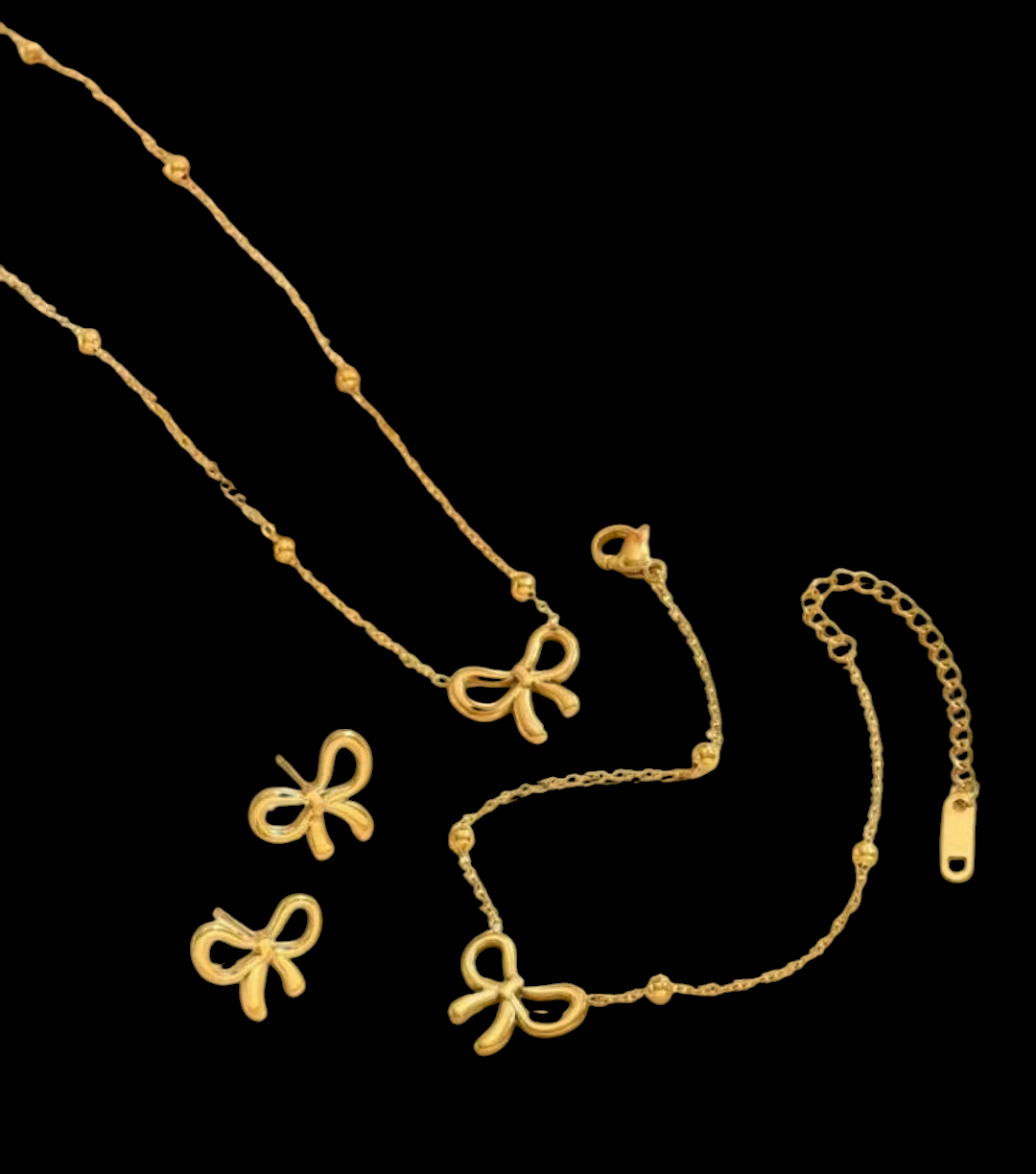 Golden Bow Charm Jewelry Set – Necklace, Bracelet, and Earrings