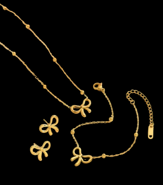 Golden Bow Charm Jewelry Set – Necklace, Bracelet, and Earrings